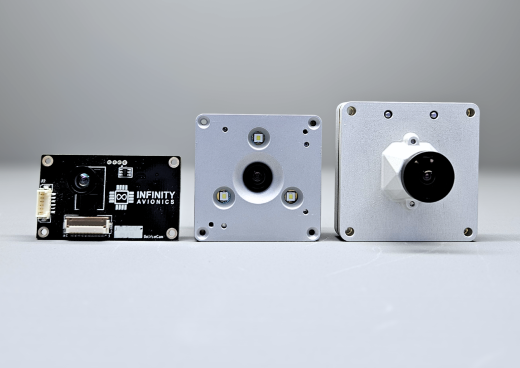 A side by side photo of the three space-qualified, integration-ready monitor cameras, SelfieCam, Leo2MP, and Aquila.
